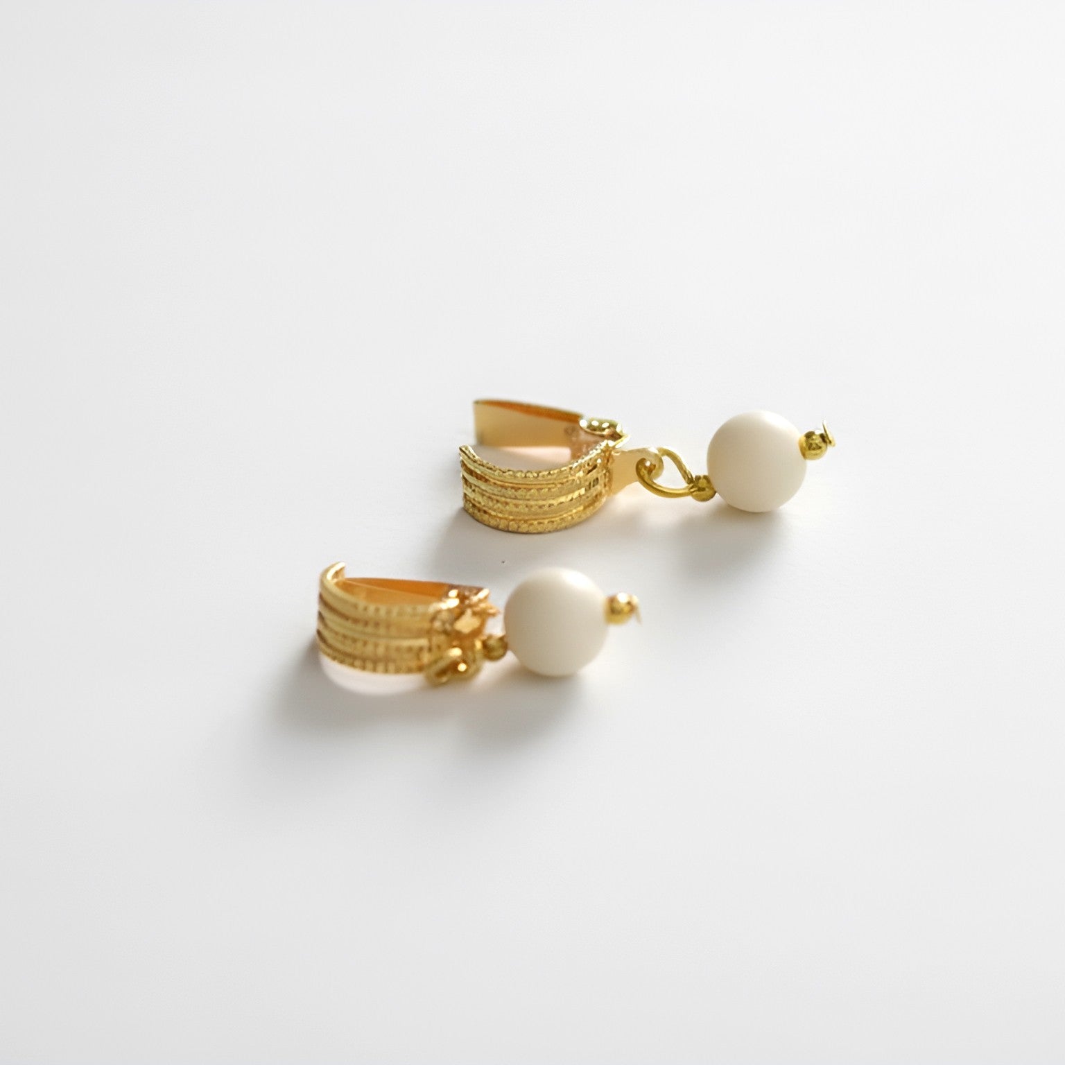 brai-glitz-	Perlen-Clip-Ohrringe	schmuck damen schweiz /suisse/svizzera-genf schaffhausen-thun-chur-lausanne-vaud							