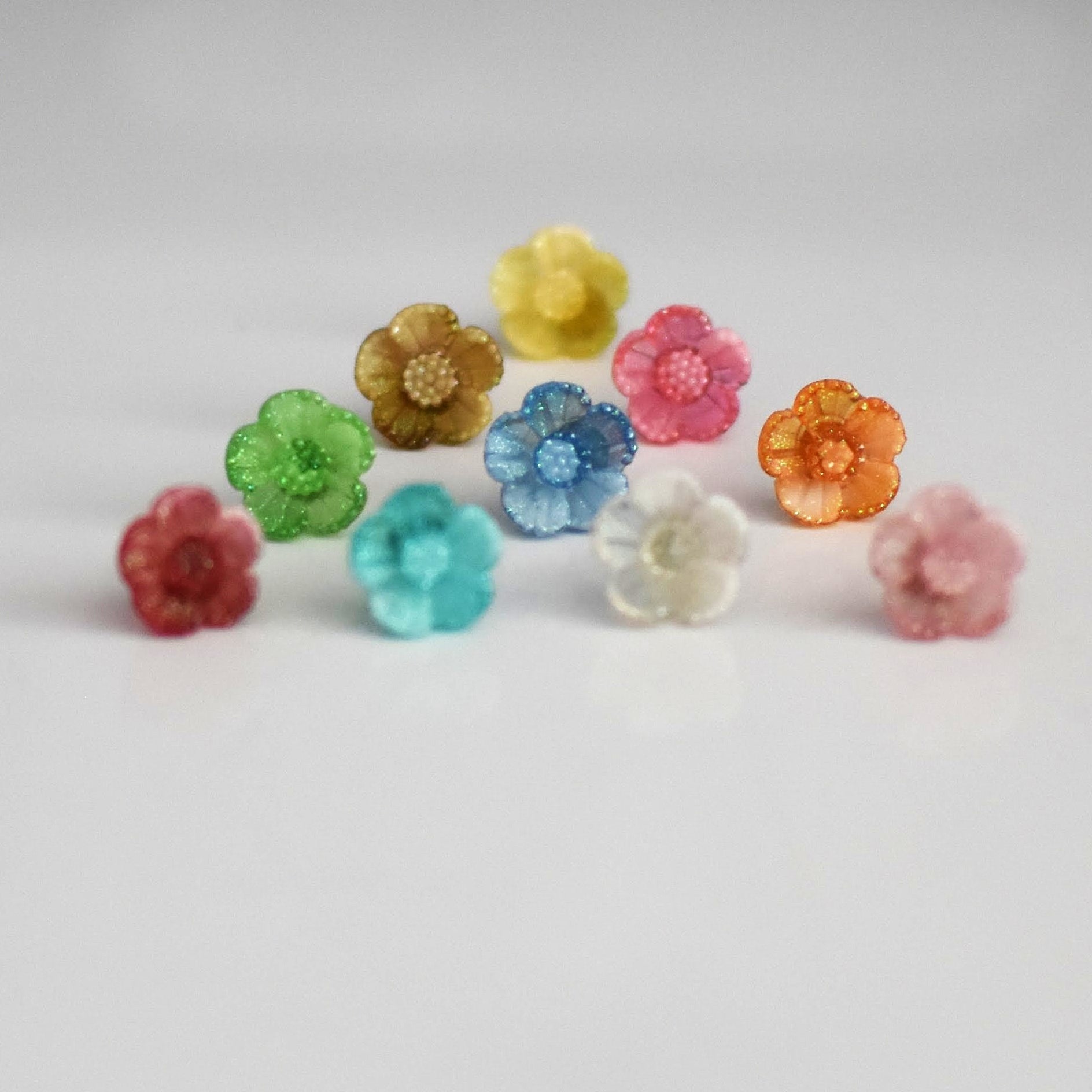 brai-glitz-	Ohrringe mit leuchtenden Blumen	schmuck damen -bijoux femme-schweiz/suisse/svizzera- genf-luzern-st. gallen -winterthur-zug						