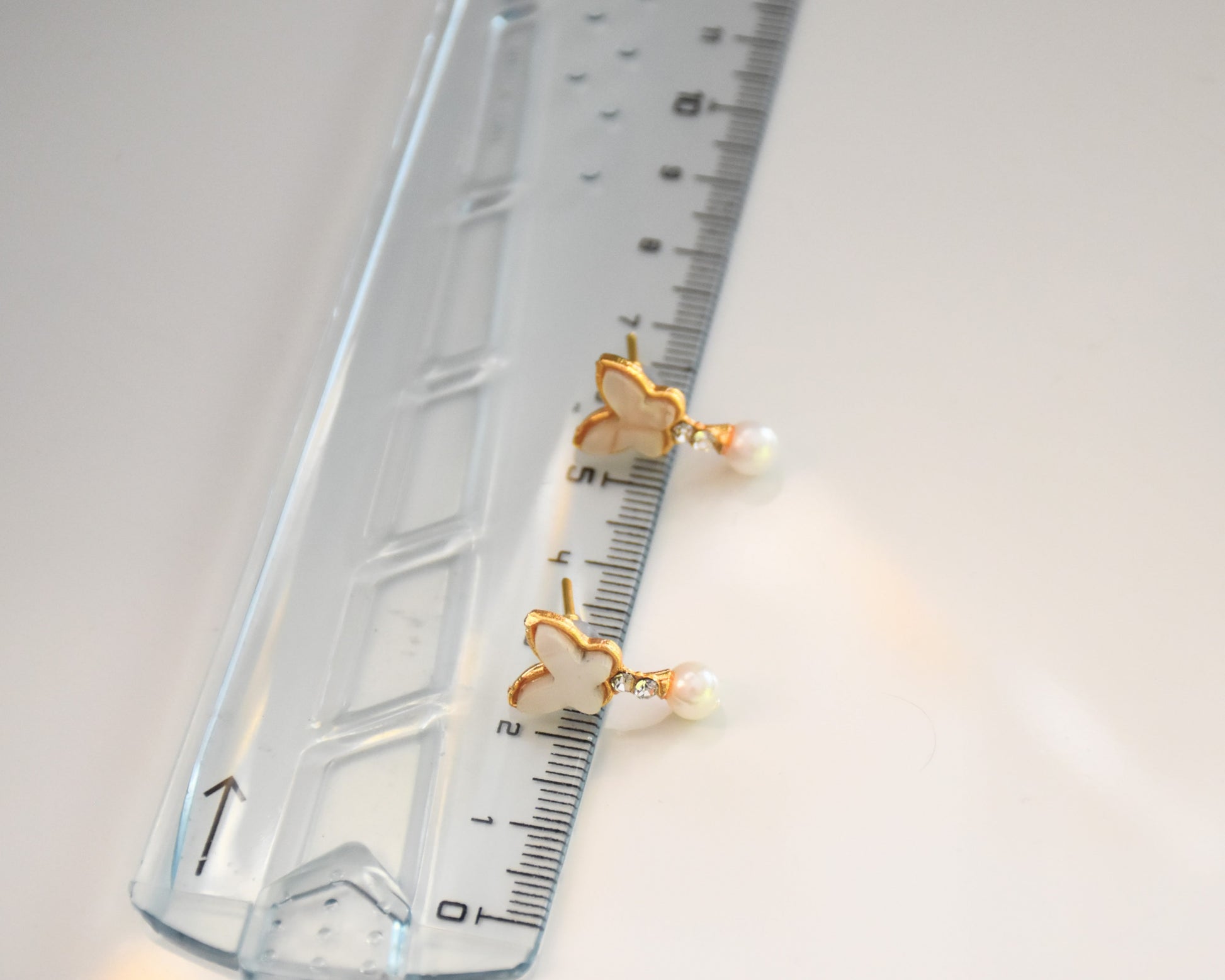 brai-glitz-	Boucles d'oreilles pendantes papillon perle	 bijoux femme suisse/schweiz/svizzera-lausanne-neuchâtel-fribourg